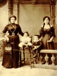 Hinda Deckelbaum (left) with children Si & Irving and unknown female, c. 1912